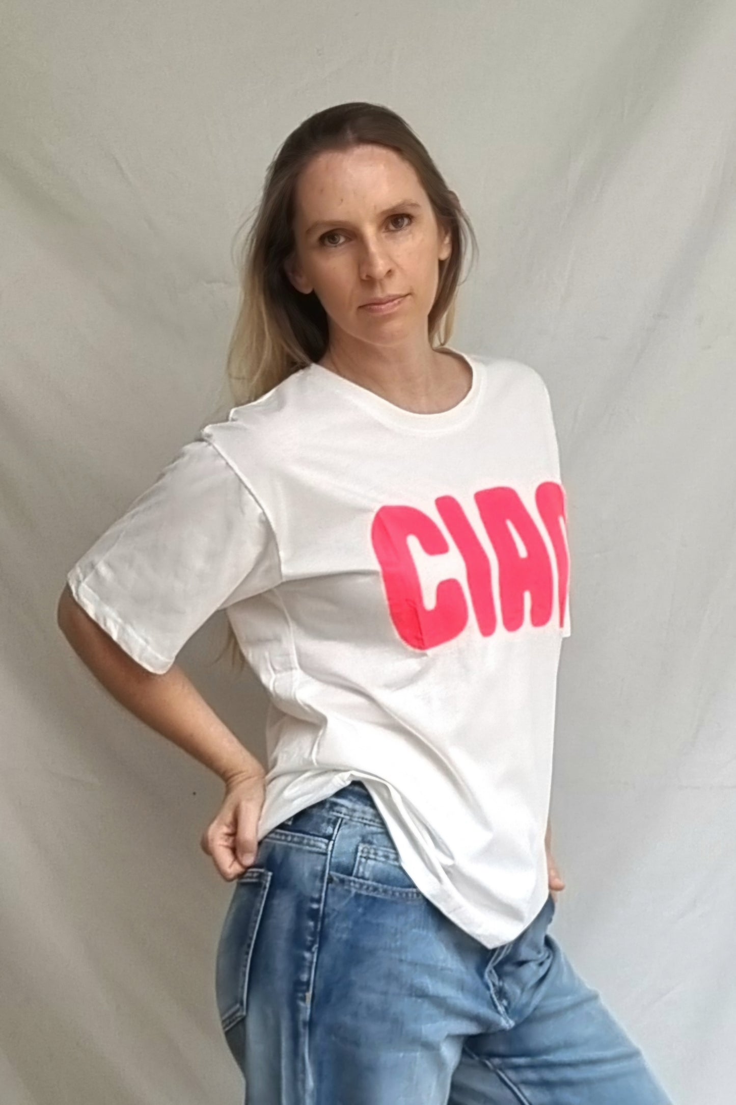 Polera Chao Blanca Fucsia